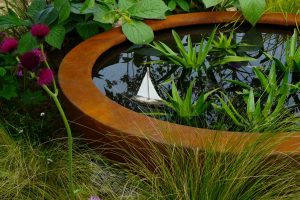 Urbis lily bowl in Gold Medal Award-Winning Garden, built by Water Gems, designed by Carolyn Grohmann at Gardening Scotland 2014