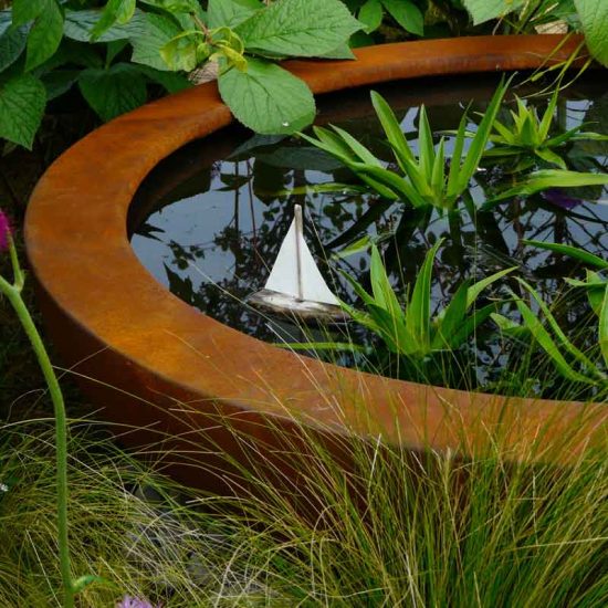 Urbis lily bowl in Gold Medal Award-Winning Garden, built by Water Gems, designed by Carolyn Grohmann at Gardening Scotland 2014
