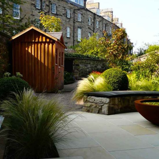 Scorched oak bench, Urbis lily bowl, Edinburgh Eton Terrace garden, built by Water Gems, designed by Carolyn Grohmann, BALI award winning 2014