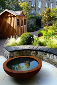 Scorched oak bench, Urbis lily bowl, Edinburgh Eton Terrace garden, built by Water Gems, designed by Carolyn Grohmann, BALI award winning 2014