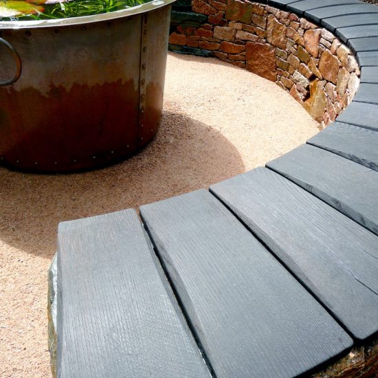 Aviemore garden, drystone bench, scorched oak seat, built by Water Gems, designed by Carolyn Grohmann, copper tub by Ratho Byres Forge