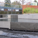 Water flowing over the weir at the rebuilt pools at John Hope Gateway, Edinburgh