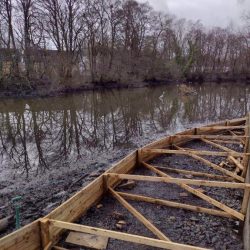Milngavie pond-edge planting area created by timber structure
